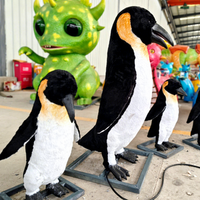 Statue d'animal animée grandeur nature véritable pingouin animatronique pour la décoration de parc animalier océanique