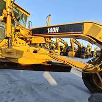 Niveleuse à moteur Caterpillar CAT 140 H d'occasion robuste avec lame de nivellement et moteur Bullgrader