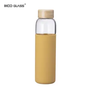 IKOO blue glass water bottle nice glass water bottle with bamboo lid and silicon sleeve