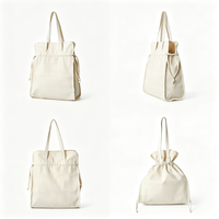 Sac fourre-tout promotionnel en toile de coton personnalisé avec fermeture à bandoulière et motif lettres, idéal pour les cadeaux et la publicité, vente en gros pour fabricants