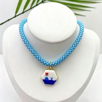 Nuevo Collar de Cuerda Redonda Tejida DIY con Colgante Pequeño Hexagonal Geométrico Pintado con Efecto Goteo de Aceite, Serie de Colores Arcoíris y Núcleo de Poliéster
