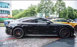 ชุดแต่งรอบคันสำหรับ Porsche Panamera 971 ปี 2017-2019 ทำจากคาร์บอนไฟเบอร์แบบแห้ง ประกอบด้วย สปอยเลอร์หน้า สปลิตเตอร์ ดิฟฟิวเซอร์หลัง สเกิร์ตข้าง และสปอยเลอร์หลัง - Product Image 3