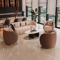 Ensemble de canapé et de chaise de bureau en cuir de luxe léger avec structure métallique, mousse haute densité personnalisable pour l'utilisation dans les hôtels et les salles d'accueil professionnelles