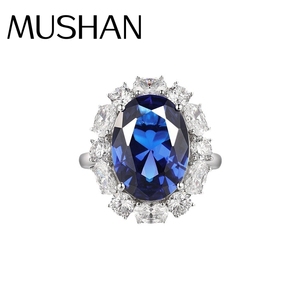Anillo <span class=keywords><strong>de</strong></span> Plata <span class=keywords><strong>de</strong></span> Ley S925 con Zafiro Azul Real Sintético <span class=keywords><strong>de</strong></span> Primera Calidad, Estilo Misterioso y Moderno para Mujer, <span class=keywords><strong>de</strong></span> MuShan Jewelry - Product Image 1