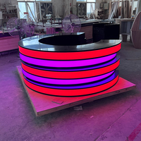 Comptoir de service LED en pierre translucide noire, moderne, rond, pour les zones de cinéma, les bars, les bureaux de réception