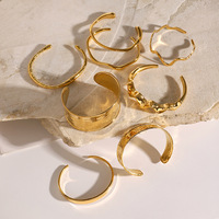 Pulsera avanzada de acero inoxidable de oro de 18 quilates Brazalete de patrón de martillo irregular de moda transfronterizo europeo americano