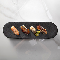 Buffet salle à manger porcelaine vaisselle vaisselle vaisselle en relief pierre Grain Sushi plateau Oblong noir mat plateau à Dessert en céramique