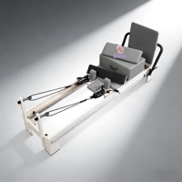 Reformer de Pilates en bois blanc écologique avec système à rail complet et tapis antidérapant pour un entraînement corporel complet en toute sécurité