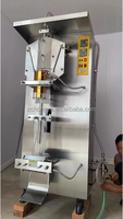 Machine de remplissage verticale d'emballage d'eau Équipement de remplissage d'eau minérale en plastique à petite échelle