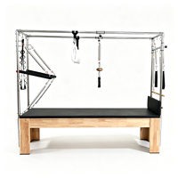Máquinas de Pilates Reformer de doble uso, modelo Cadillac de roble con barra de rodadura para entrenamiento en pareja