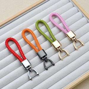 Porte-clés créatif en cuir tressé, porte-clés de voiture transfrontalier en métal, pendentif de sac à fermoir mors, petit cadeau personnalisé - Product Image 1