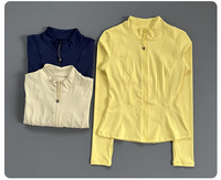 Chaqueta de yoga para mujer con cremallera, cuello alto, cintura contorneada, orificio para el pulgar, manga larga, para entrenamiento y gimnasio, con logo OEM personalizado 2026