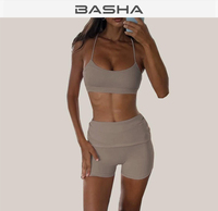 Ensemble de yoga rose de haute qualité pour femmes, comprenant un soutien-gorge push-up sexy sans dos et un short de course taille haute rehausseur de hanches, idéal pour le fitness et les activités sportives.
