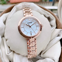 Montre à quartz pour femme, petite et élégante, en acier inoxydable, T094, aiguilles lumineuses, cadran or rose 26 mm, étanche