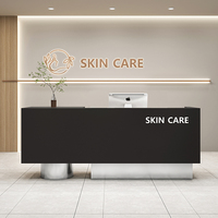 Comptoir d'Accueil Haut de Gamme Moderne en Pierre de Grotte Minimaliste avec Lumière LED en MDF pour Hôtel, Magasin de Vêtements et Salon de Beauté