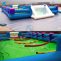 Terrain de football glissant gonflable à louer avec lit de saut Jouets et structures d'extérieur pour glisser et glisser