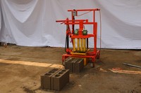 Machine à fabriquer des blocs de ciment creux QTM2-45, petite, manuelle, au prix le plus bas, machine à fabriquer des briques autobloquantes