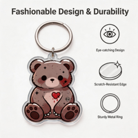 Porte-clés en acrylique en forme d'ours au cœur brisé sombre