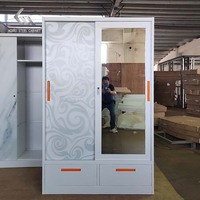 Armoire moderne à double porte coulissante en acier avec miroir à transfert floral, placard et armoire de rangement pour chambre à coucher