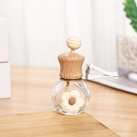 Bouteille d'aromathérapie de voiture avec pince de sortie d'air bouteille suspendue de parfum de voiture décoration de voiture