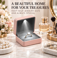 Boîte à bijoux moderne de luxe en similicuir pour boucles d'oreilles, bracelets, colliers et bagues, avec éclairage intégré, vente en gros