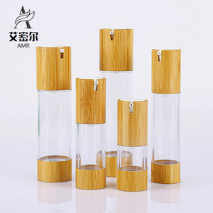 Botella cosmética transparente con tapa de bambú Amr y cabezal dosificador para set de envases de tónico - Product Image 1