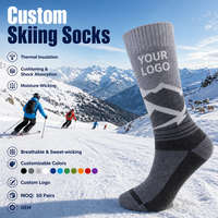 Chaussettes de ski personnalisées OEM en gros, mélange de laine thermique, chaussettes montantes rembourrées, anti-humidité, pour jeunes, hommes et femmes, sports d'hiver