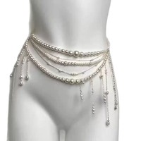 Chaîne de taille en perles multicouches personnalisées avec pompon et boucle ardillon en cuivre pour robe et jean femme – Vente en gros