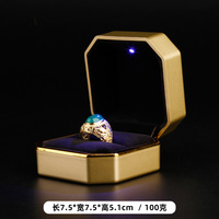 Boîte à bijoux octogonale personnalisée avec atmosphère lampe à LED peinture en aérosol bord doré pour bague en diamant pendentif caractéristiques impression LOGO