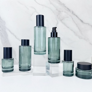 ขวดหยดแบบแบนสีดำขนาด 1 ออนซ์ สำหรับน้ำมันหอมระเหย ขายส่ง ขวดเซรั่มเครื่องสำอางแก้วก้นหนาขนาด 40 มล. แบบกำหนดเองได้ - Product Image 1