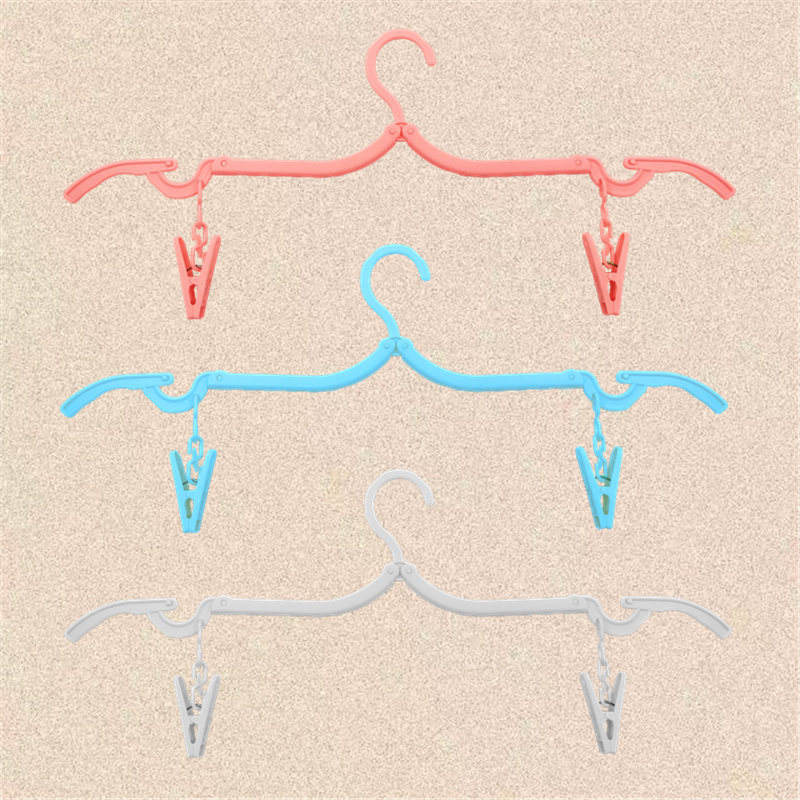 Percha plegable con pinzas y cadena (empaquetada individualmente)