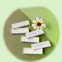 Boîte à boucles d'oreilles chic blanche avec trous, emballage en carton pour coffrets cadeaux