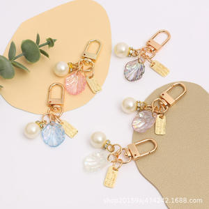 พวงกุญแจรถห้อยสดใสน่ารักสีสันสดใสประดับกระเป๋ามุก - Product Image 1