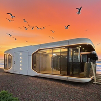 Solution de maison mobile fabriquée en Chine : maisonnette confortable, maison capsule, mini hôtel tendance en forme de vaisseau spatial