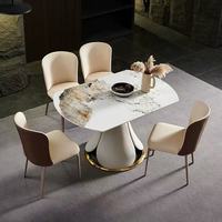 Table à manger moderne en pierre frittée à pieds en métal assemblée résistante à la chaleur pour un hôtel, un appartement et une villa