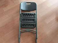 Chaise pliante noire portable en plastique moderne pour les événements intérieurs et extérieurs Party