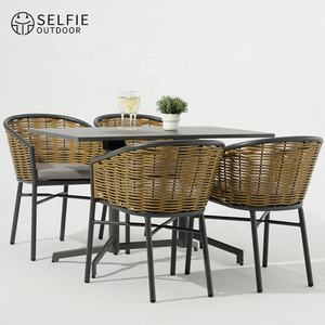 Ensemble de table à manger d'extérieur moderne avec 10 chaises en rotin pour cour, patio, jardin, hôtel - Product Image 1