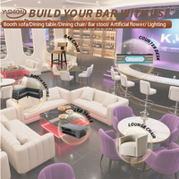Comptoir de bar commercial moderne durable personnalisable en pierre et plastique avec éclairage LED pour restaurants et hôtels