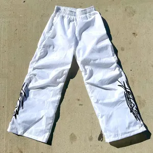 Celana panjang nilon untuk pria, celana windbreaker olahraga poliester tahan air dengan logo bordir kustom kualitas tinggi untuk pria
