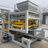Machine à fabriquer des briques en béton QT4-15, équipement entièrement automatique pour blocs creux et pavés