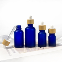 Bouteilles d'huile essentielle cylindriques rondes personnalisées avec compte-gouttes en verre 5ml 10ml 15ml 20ml 30ml 50ml 100ml Emballage de bouteilles d'huile d'olive
