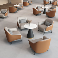 Ensemble de canapé simple et table ronde de style italien de luxe pour hall d'hôtel, centre de vente, salle d'exposition, espace lounge