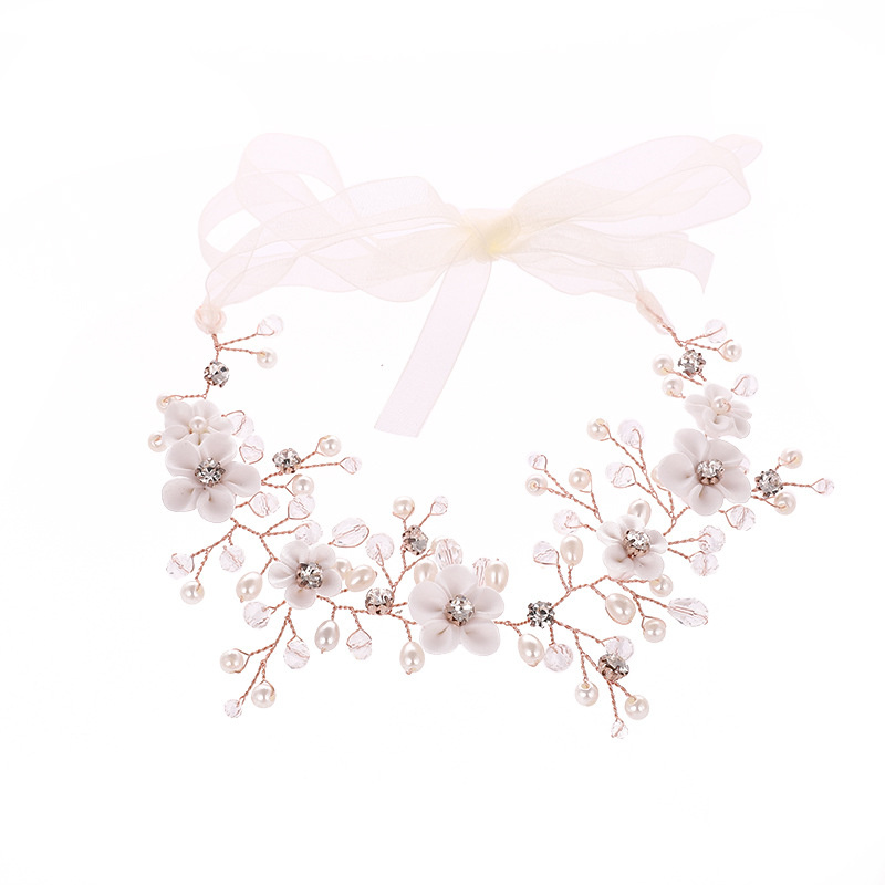 Женский обруч для волос с жемчужинами и кристаллами