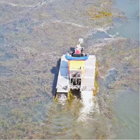 Machine amphibie avec moteur et fonctions automatiques pour le nettoyage professionnel des fossés, la gestion de la végétation aquatique et les zones municipales