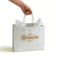 Sac shopping en papier blanc de luxe avec logo estampé or et poignée en corde torsadée pour bijoux, mariage, boutique, emballage cadeau de marque