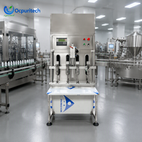 Ligne de production d'eau en bouteille commerciale, machine de remplissage de liquides en acier inoxydable à quatre buses, solution clé en main