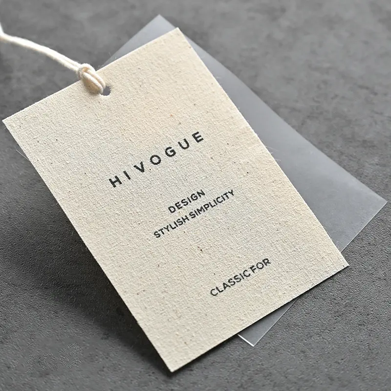Customized Luxury Cotton and linen canvas frosted PVC soft adhesive Paper Logo Embossed Hang Tags For Cloths