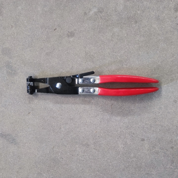 Collier de serrage pour tube (poignée droite rouge)