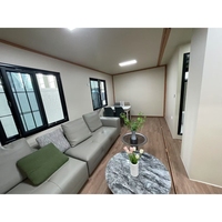 Maison conteneur extensible de 20 pieds à panneaux sandwich contrôlée par l'IA avec climatisation et salle de bain