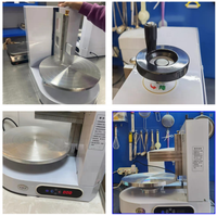 Machine automatique améliorée pour l'étalement, la décoration et le lissage de la crème et de la glaçage sur les gâteaux d'anniversaire ronds